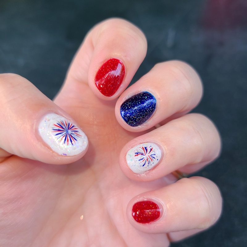 red and silver glitter on blue nails for Fourth of July