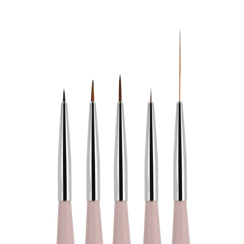 selection of different types of nail brushes for manicure techniques