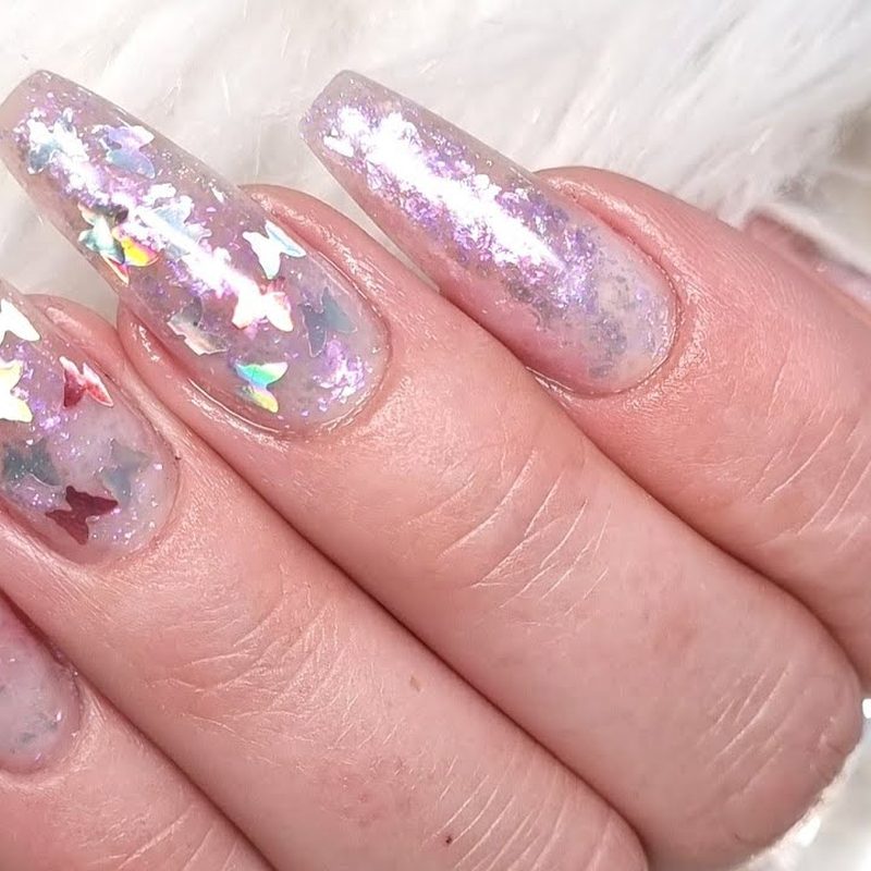 step-by-step application of nail art glitter flakes with precision brush