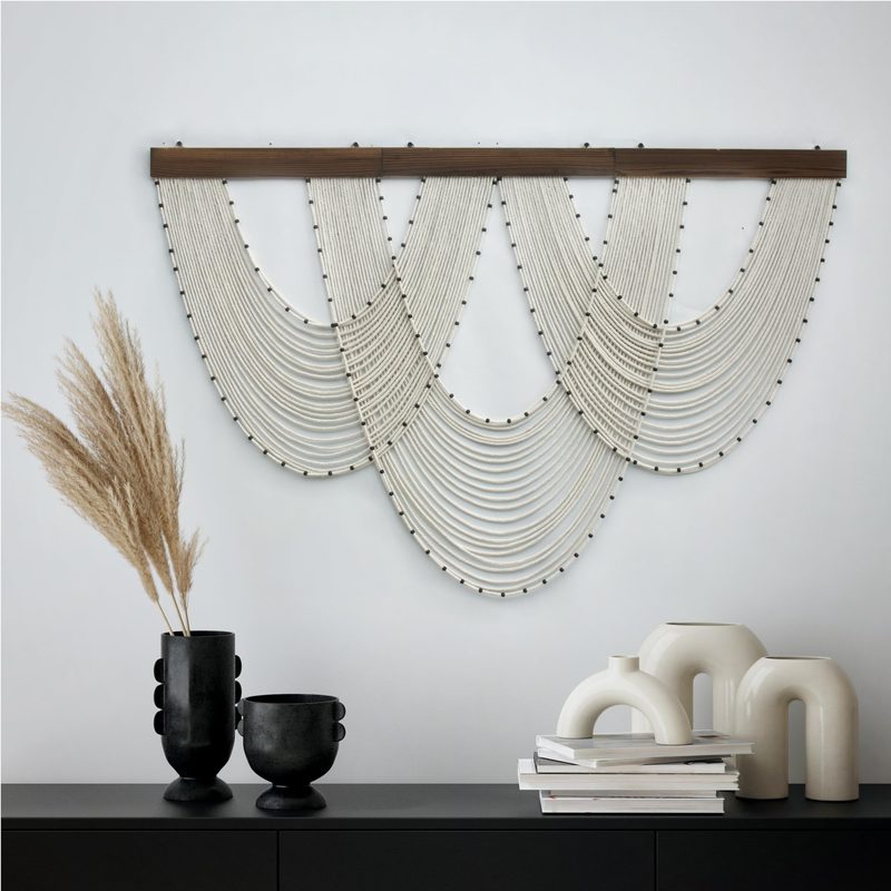 string art wall decoration in modern nail salon interior