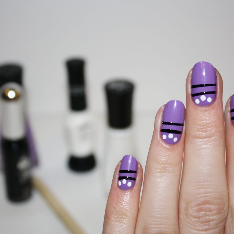woman applying gel pen nail art step by step